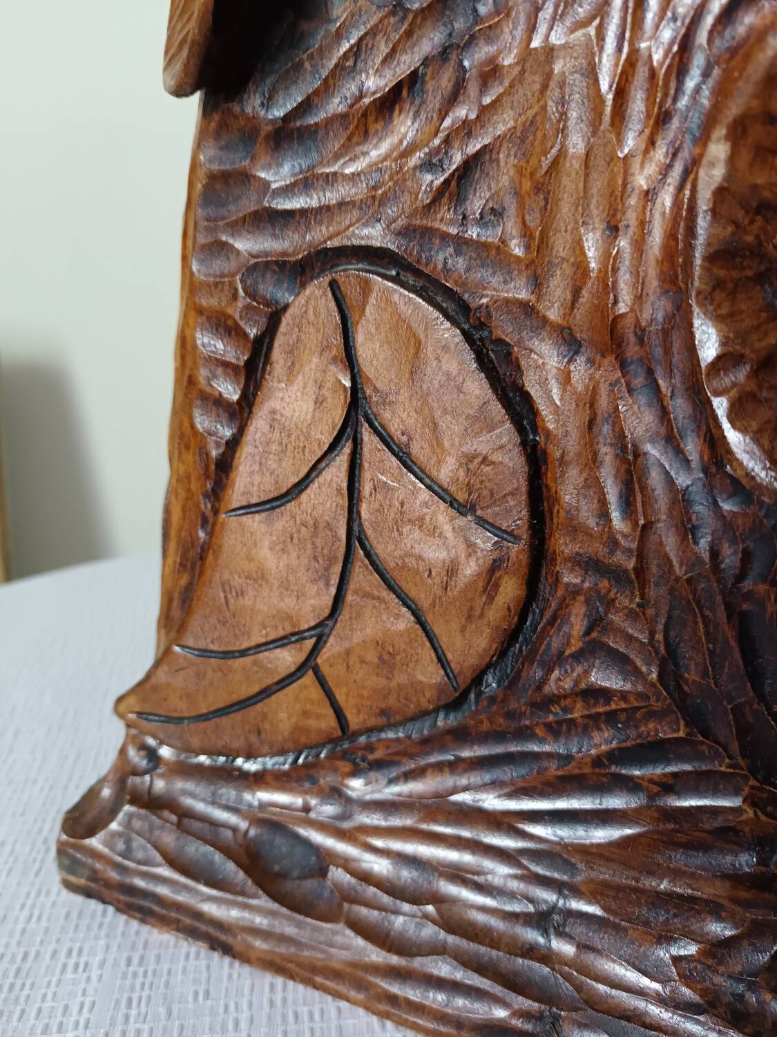 Sculpted wooden table lamp with vintage cord