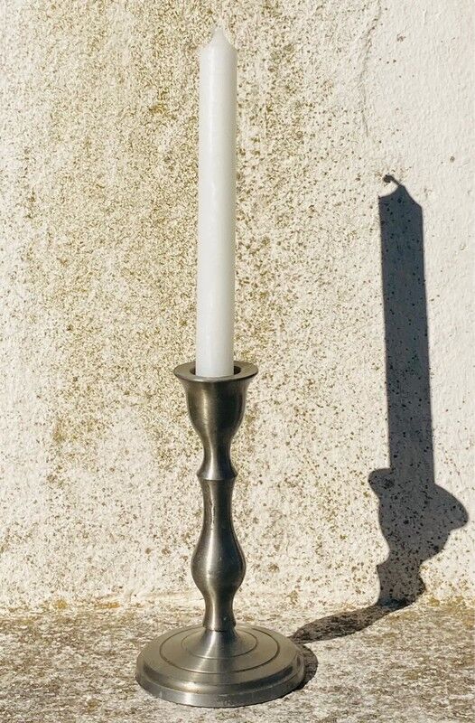 Old tin candle holder