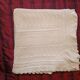White cotton hand-knitted blanket