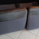 Black leather two-seater sofa