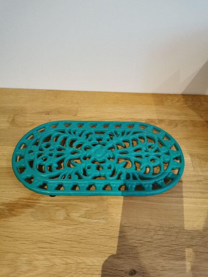underside of the cast iron dish painted blue