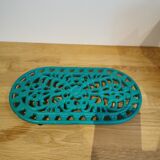 underside of the cast iron dish painted blue