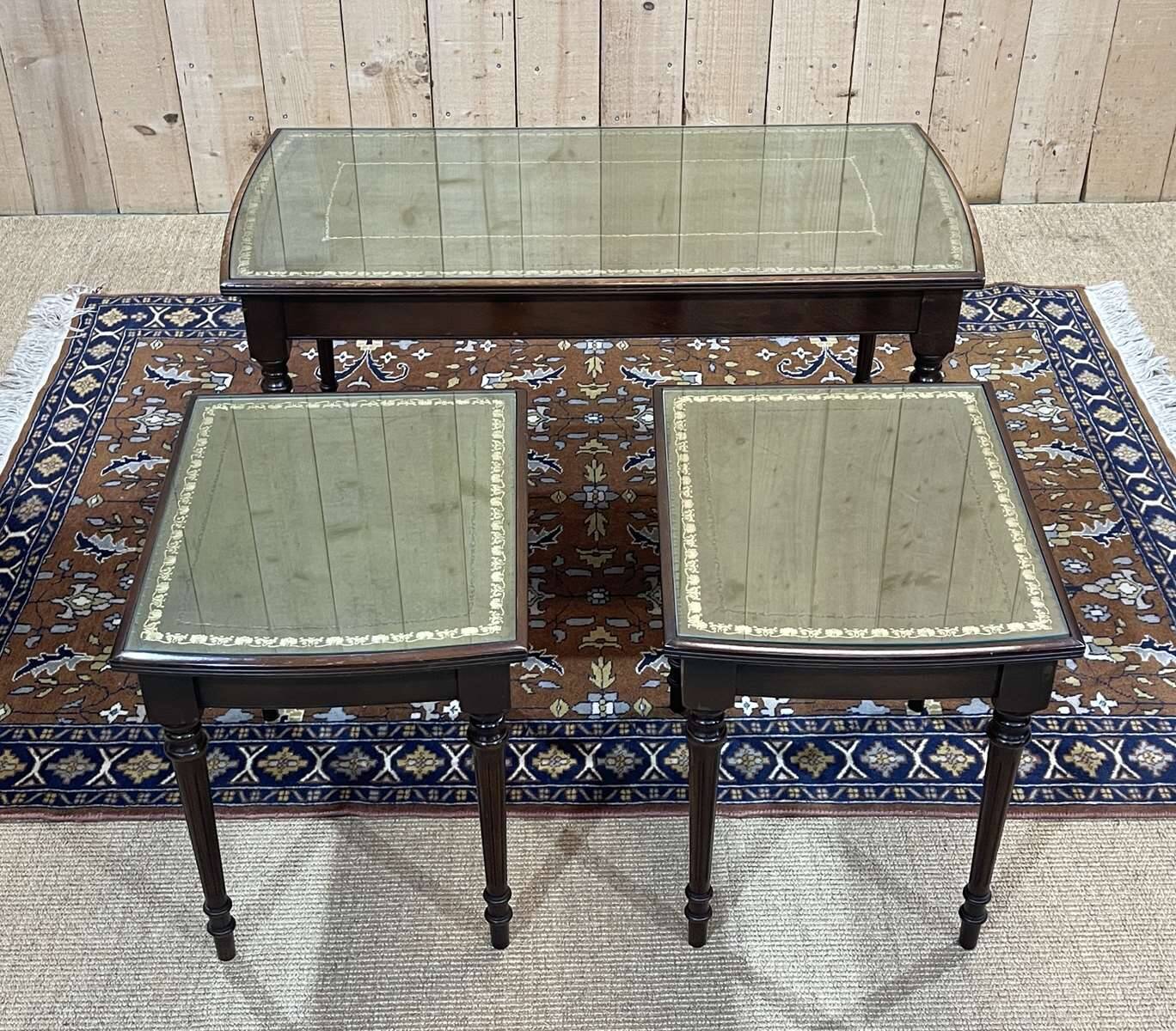 English nesting tables in mahogany and leather top under glass - work from the 1950s