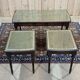 English nesting tables in mahogany and leather top under glass - work from the 1950s