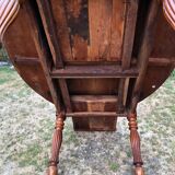 Louis Philippe oval shuttered table in solid cherry wood with 2 drawers.