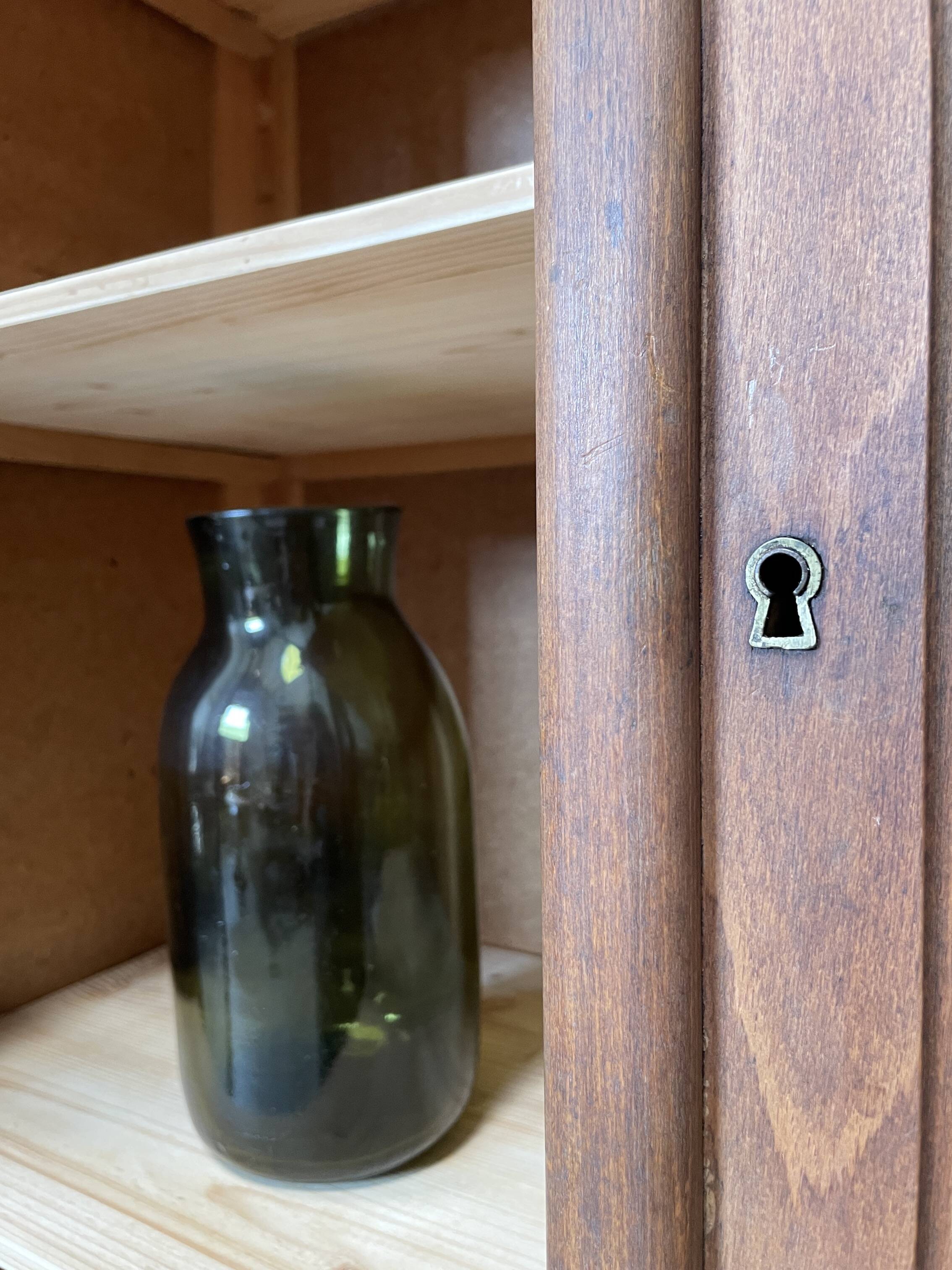 Solid wood display cabinet.