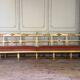 Carved wooden bench, gilded and painted, Italy around 1880, 510cm long.