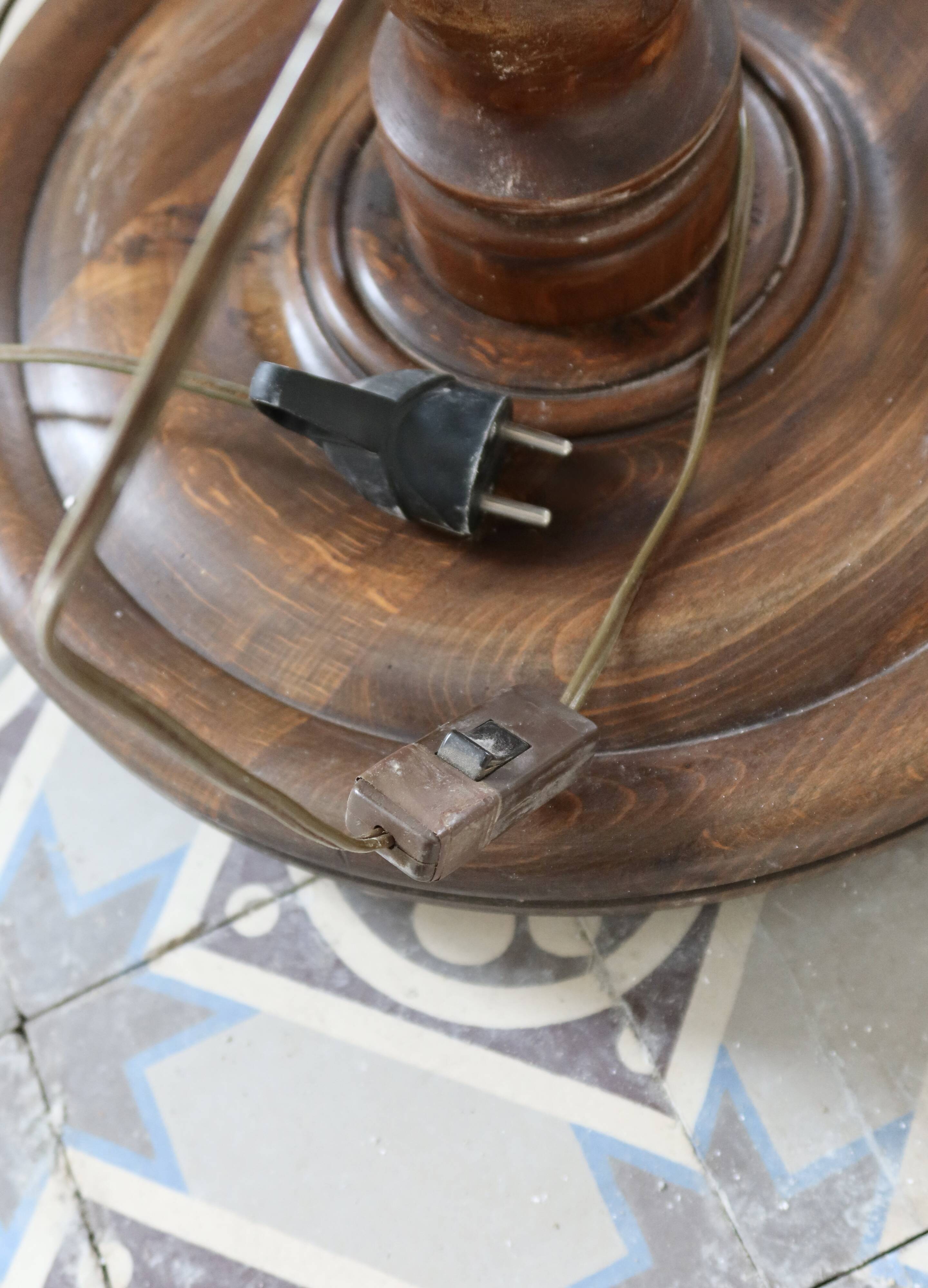 Vintage twisted turned wooden lamp base with shelf.