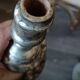 Rare pair of antique silvered terracotta candlesticks from the 17th century.