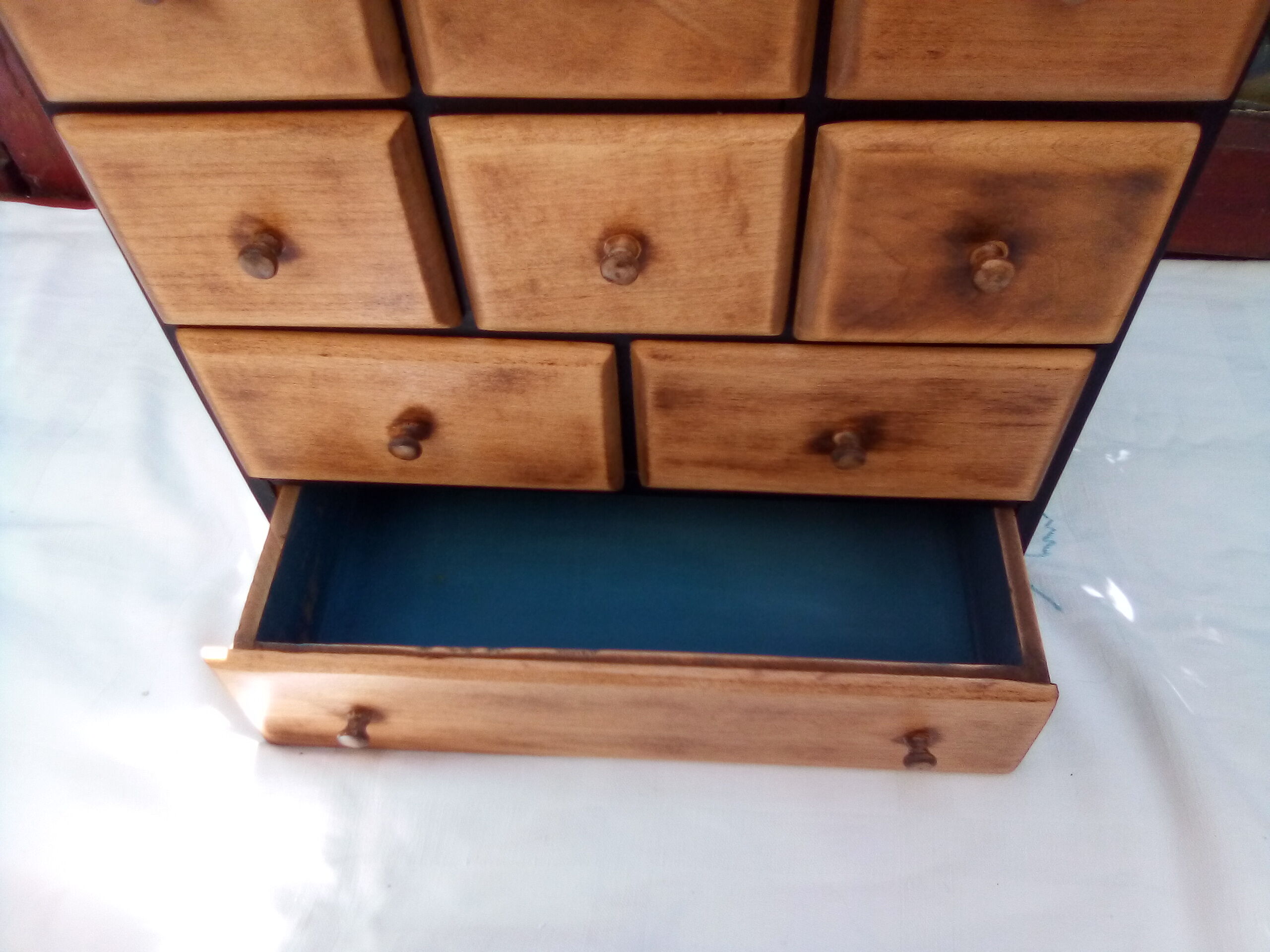 Small furniture with small drawers says layette