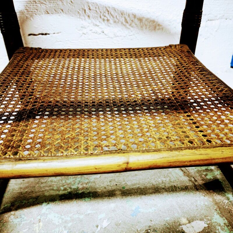 Side table in rattan and smoked glass