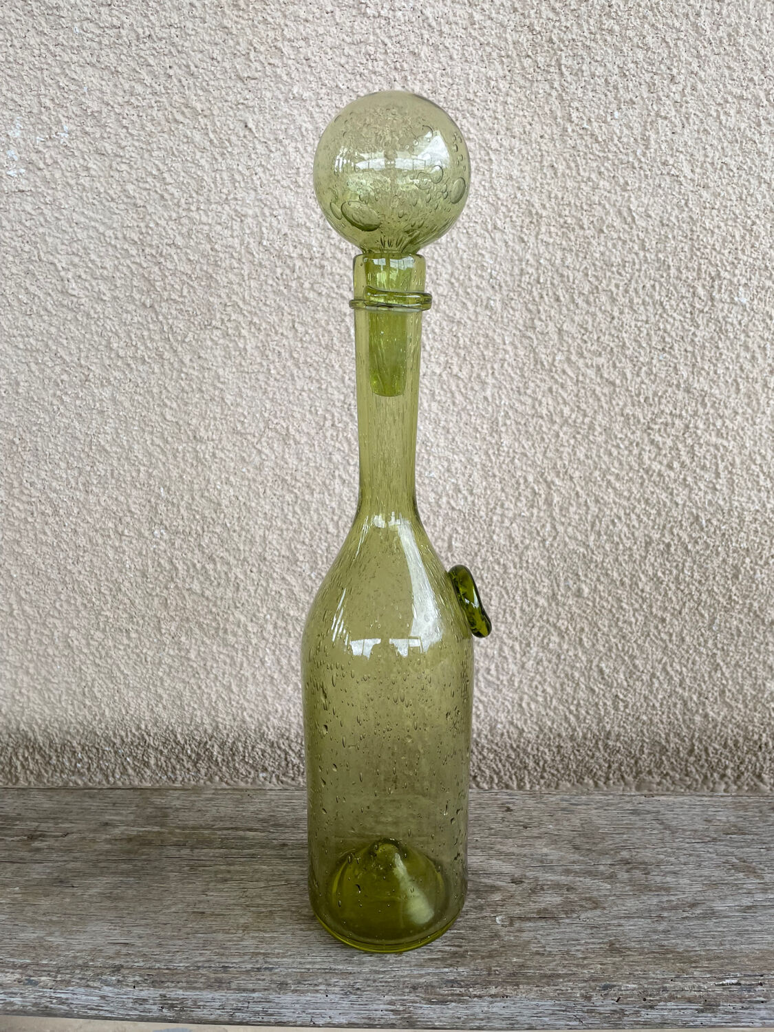 70s biot glass bottle