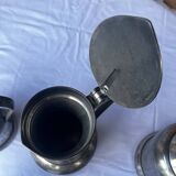 6 pewter pitchers
