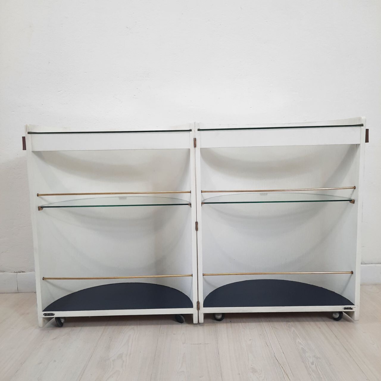 Vintage openable cylinder shaped bar cabinet, wood, brass and glass.