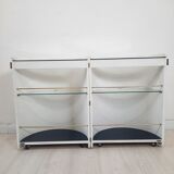 Armoire à barre vintage en forme de cylindre ouvrable, bois, laiton et verre.