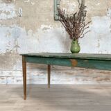 Vintage farm table with spindle legs.