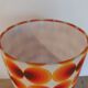 Table lamp in a seventies style | orange psychedelic round lampshade