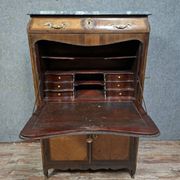 Louis XV period secretary in marquetry and veneer, 18th century.
