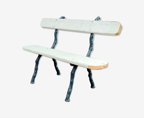Garden bench with old cast iron legs