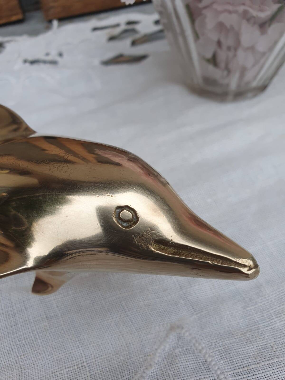 brass dolphin
