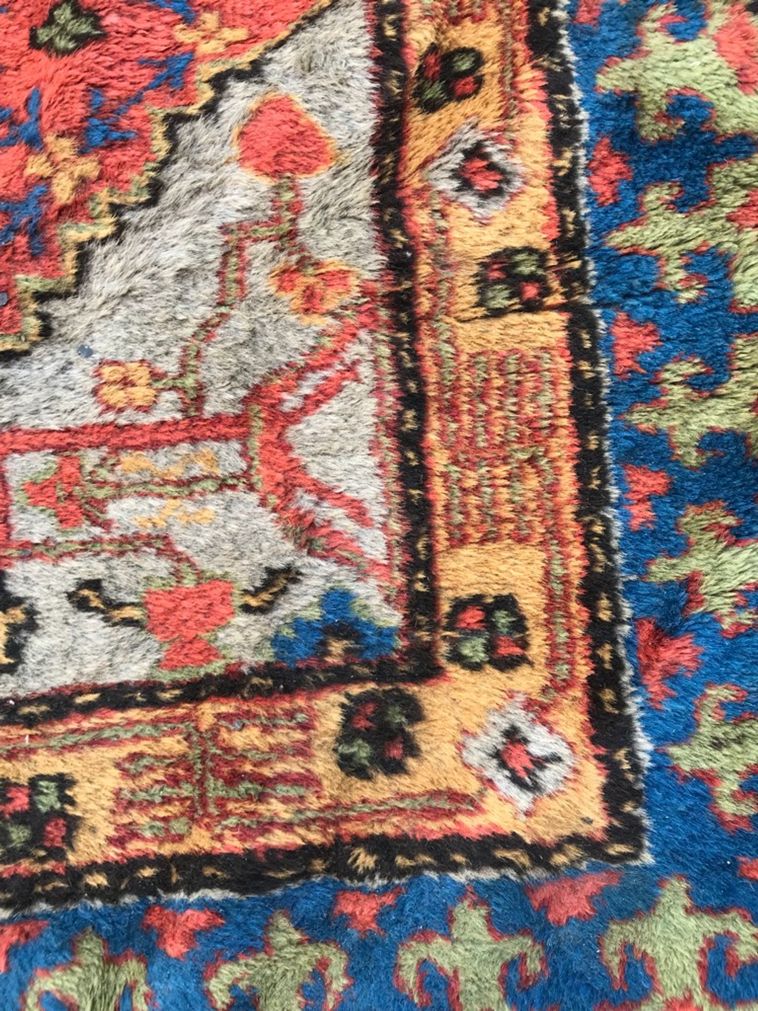 Old sinkiang oriental rug handmade 68 x 139 cm