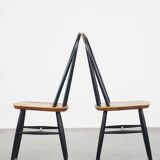 Set of 4 vintage wooden design chairs with black spindle backrest and brown seat