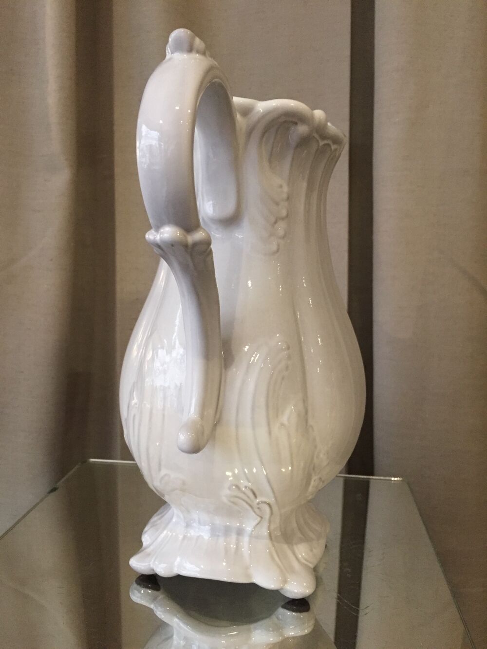 Pitcher has beautiful model beyerle niderviller black earth enamelled with white