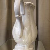 Pitcher has beautiful model beyerle niderviller black earth enamelled with white