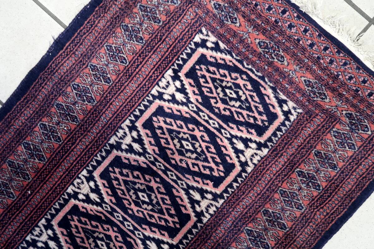 Handmade vintage 1960s Uzbek Bukhara rug – small wool tribal carpet (65cm x 95cm)