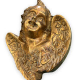 Pair of angel head wall sconces in gilded composition