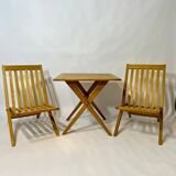 Vintage design solid wood scissor chairs and table from the 1970s