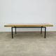 1950s modernist coffee table, wood and black metal.