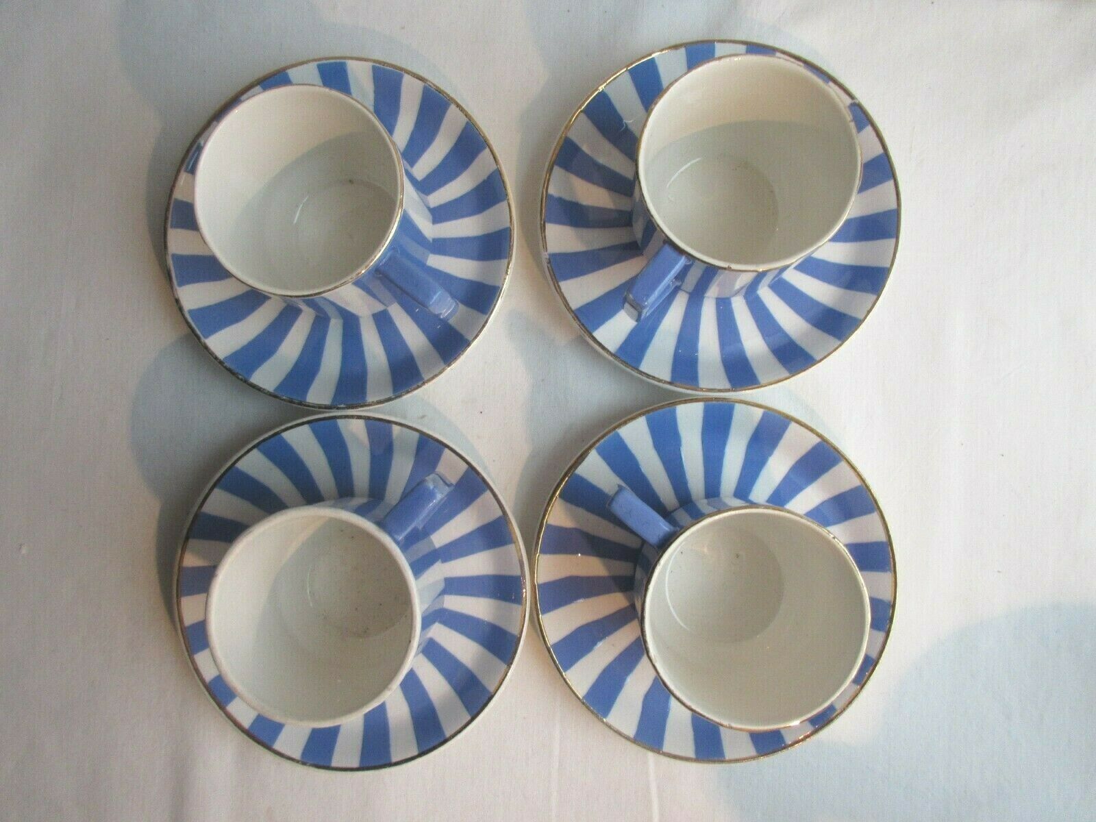 Set of 4 coffee cups and 4 saucers signed Sarreguemines, model FOX TROTT