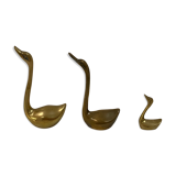 Family of brass swans of the 70s