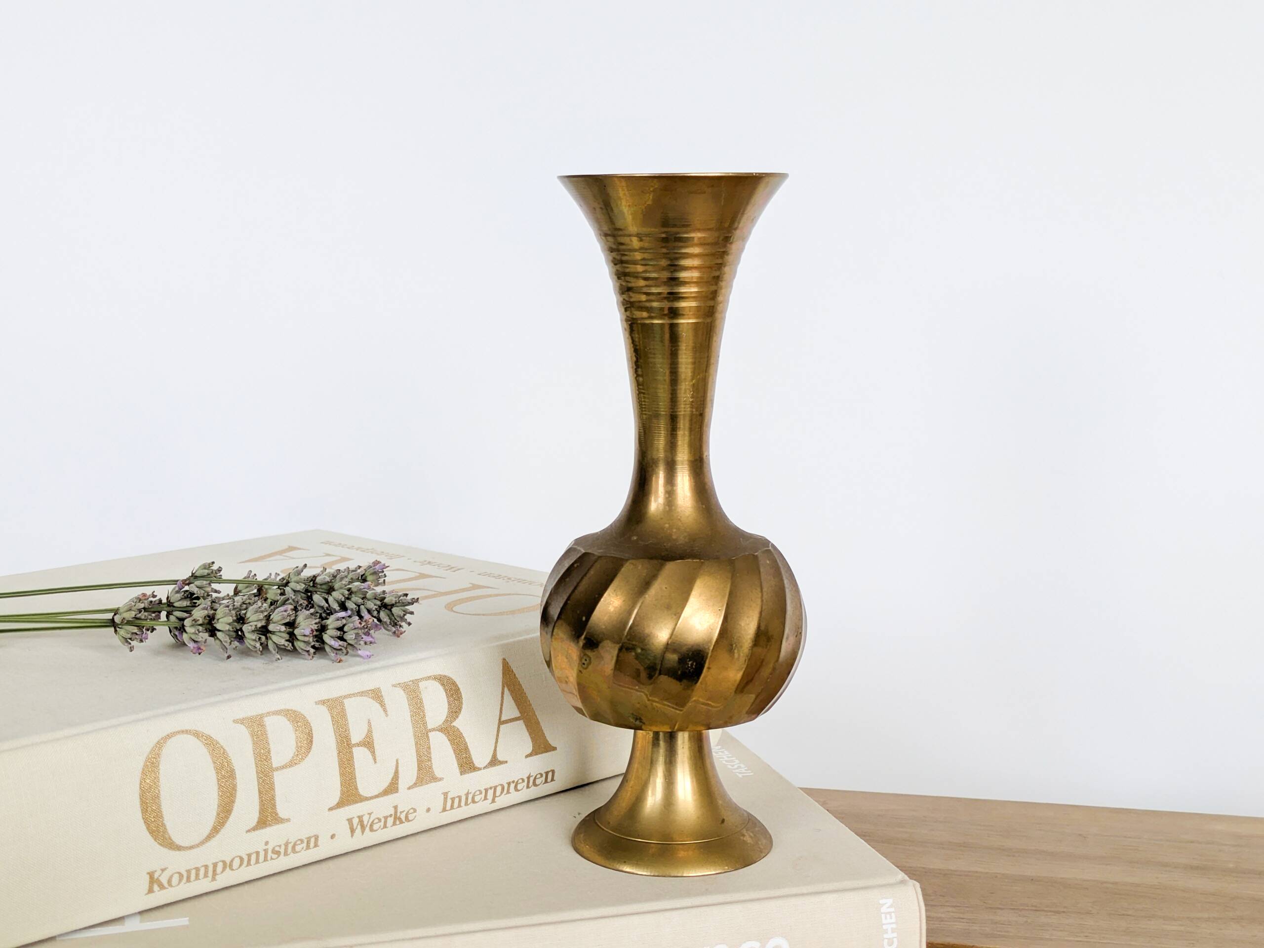 Solid brass Midcentury vase in trumpet shape with twisted details.