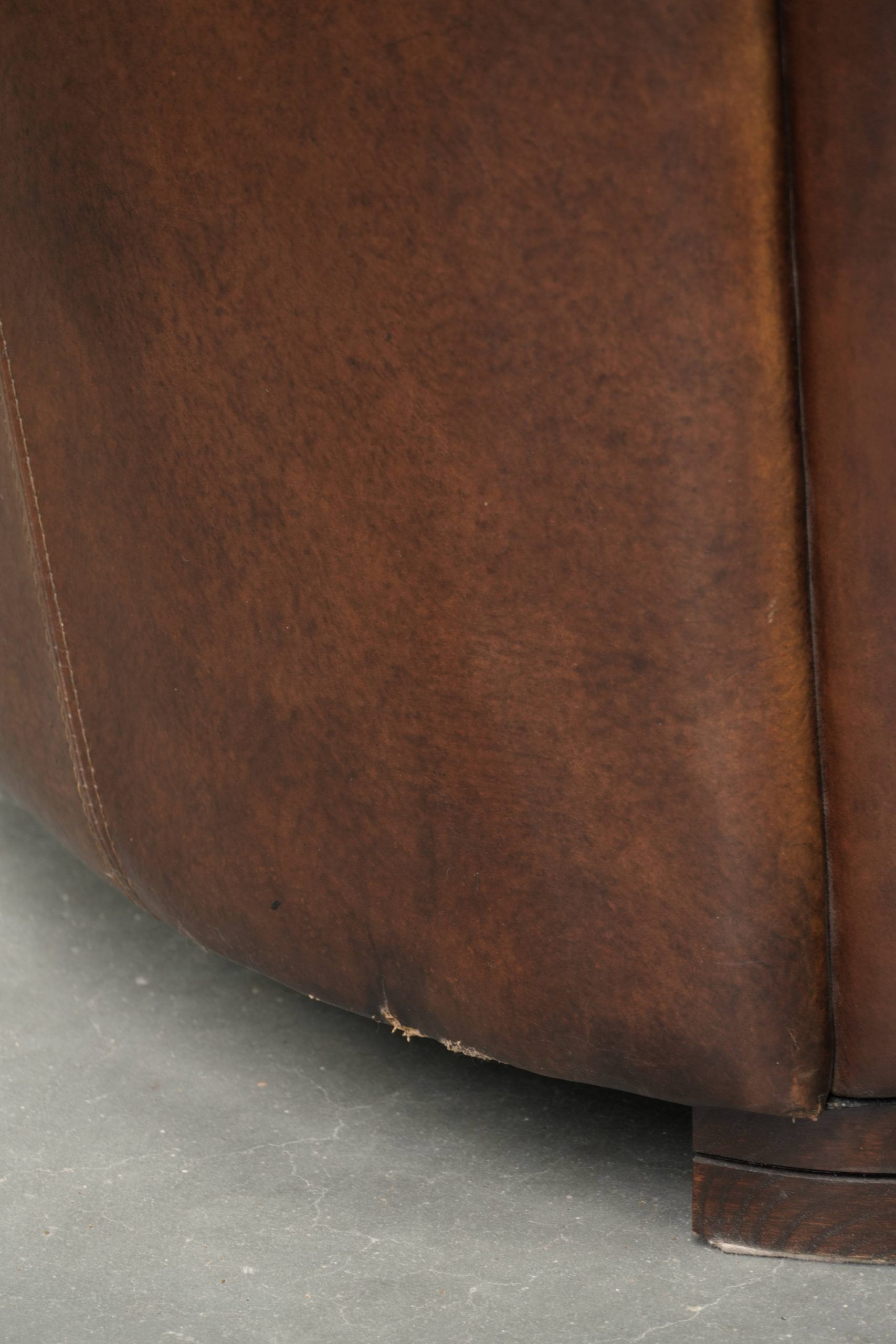 Sturdy dark cognac brown cow leather Aviator design armchair