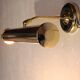 Two gold metal picture sconces