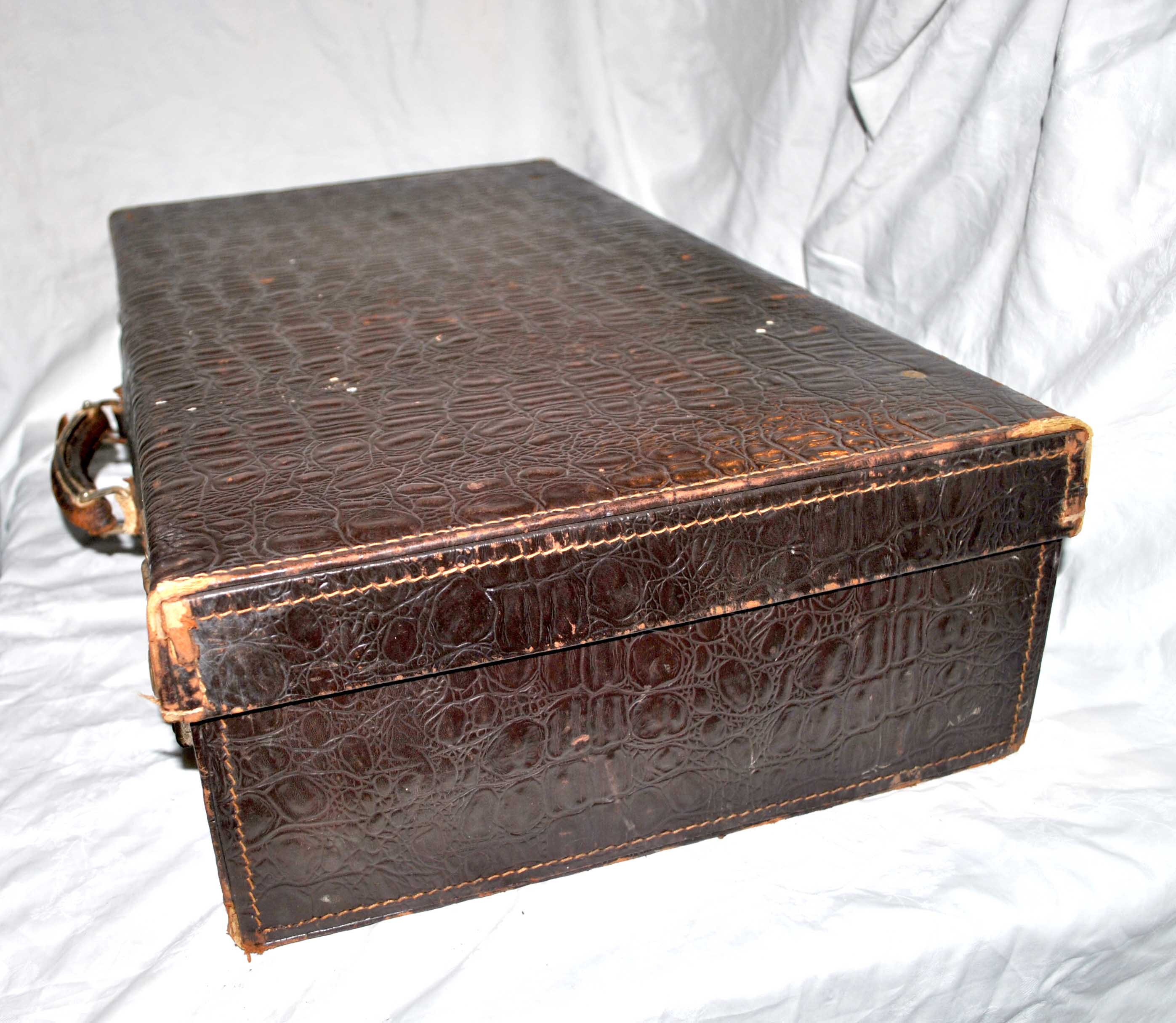 Vintage brown leather suitcase