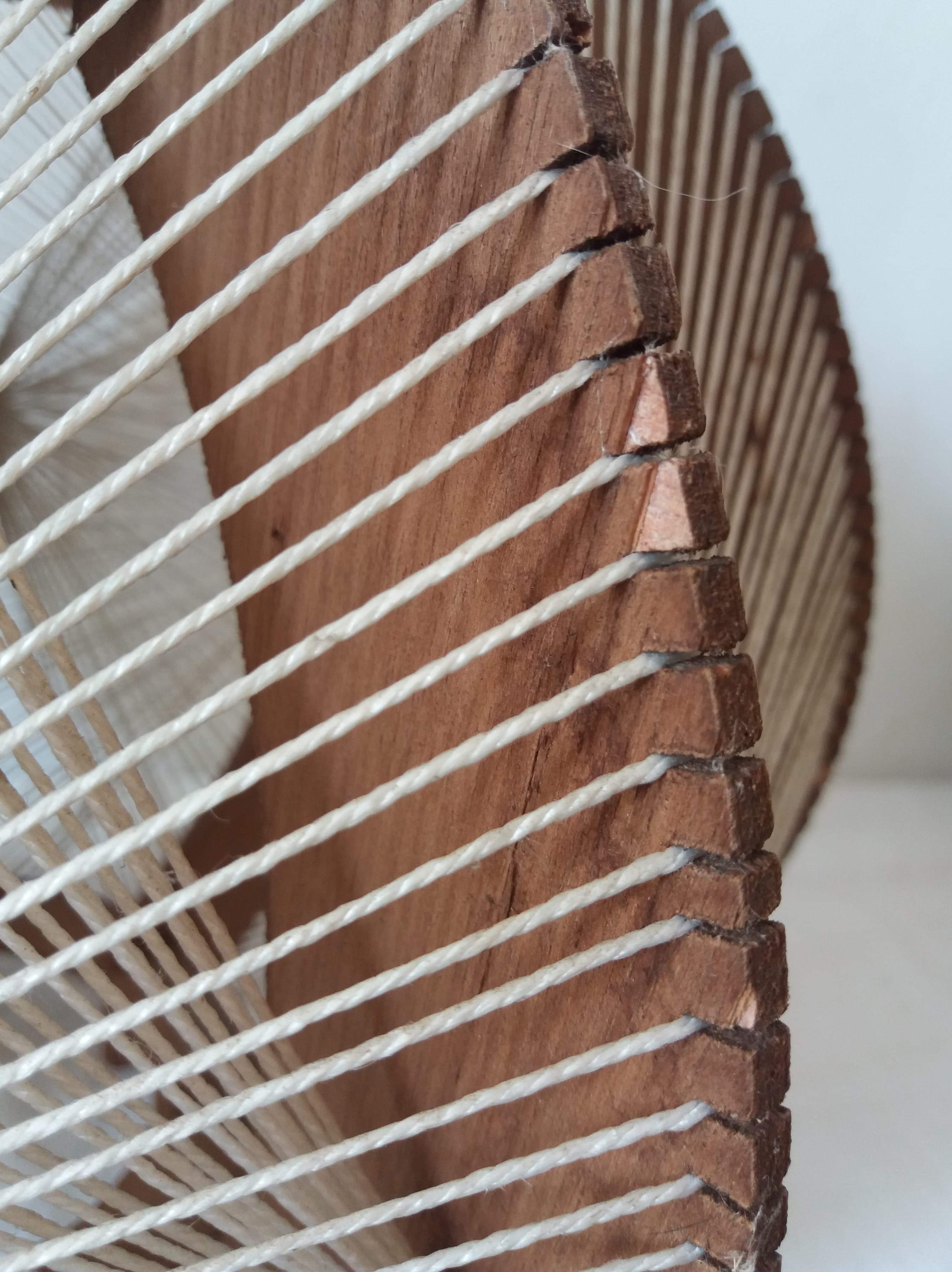 Scandinavian hanging lamp in wood and stretched wires