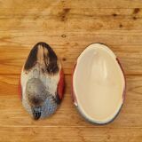 Antique earthenware terrine in the shape of a duck.