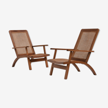 pair of french mahogany and cane armchairs, 1950s