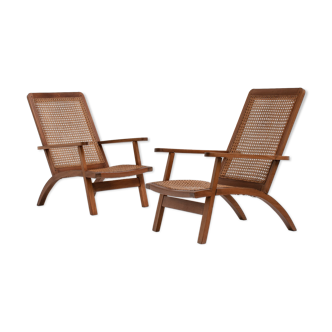 pair of french mahogany and cane armchairs, 1950s