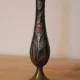 Vintage brass soliflore vase with black, red, and green floral decoration – H 18 cm