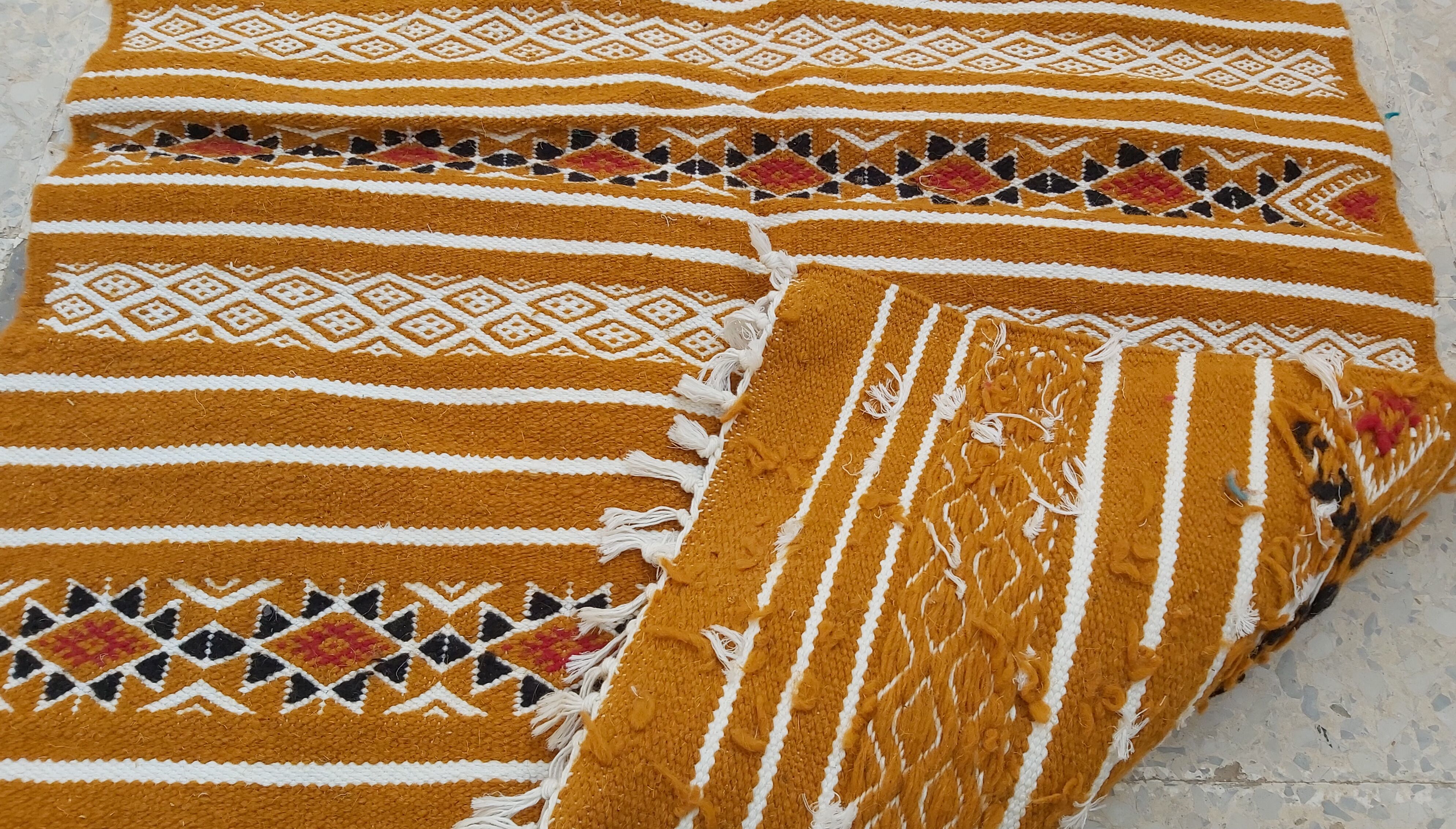 Traditional handmade small-size rug  114x64cm