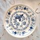 Mismatched antique dinner plates