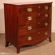 Commode bombée en acajou et incrustations, circa 1800