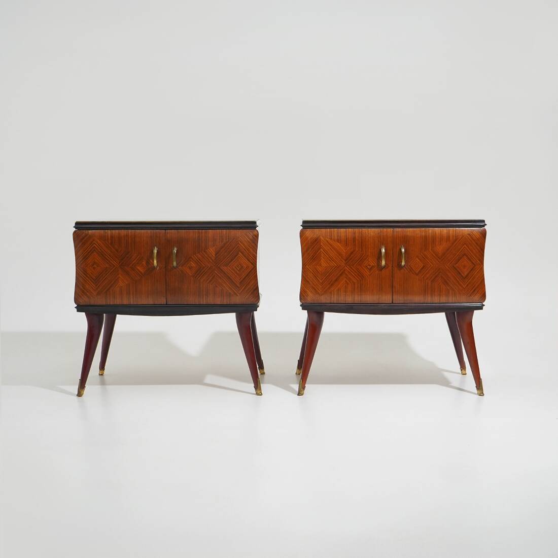Pair of bedside tables with glass top, 1950s