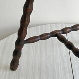 Antique three-legged twisted wooden stool