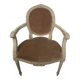 Louis XVI style bergère armchair in patinated wood