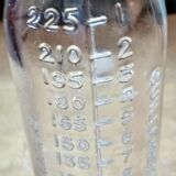 2 old graduated pharmacy bottles